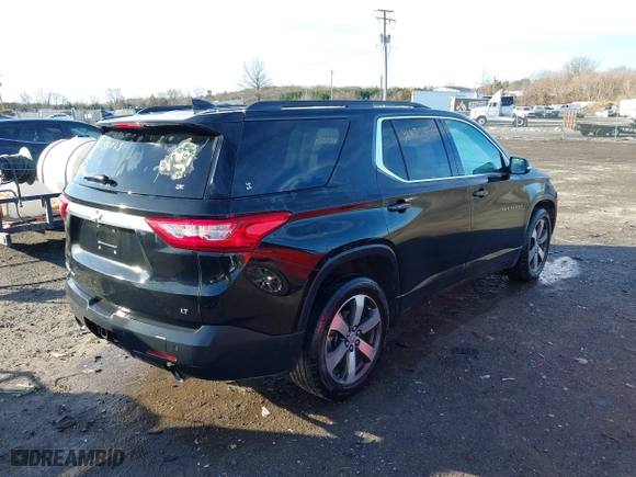 2019 Chevrolet Traverse LT Leather with VIN 1GNEVHKW3KJ230210, listed as a IAAI auction lot 41453033 with 98,416 mi miles. Bid and sale history available at carsss.com. Image 4.