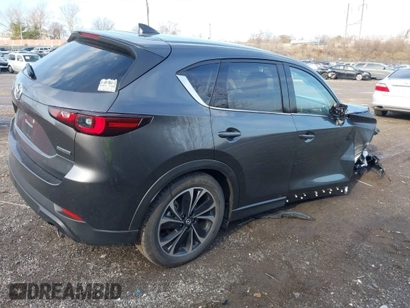2023 Mazda CX-5 2.5 S Premium Package with VIN JM3KFBDM2P0246520, listed as a IAAI auction lot 41100226 with 9,537 mi miles. Bid and sale history available at carsss.com. Image 4.
