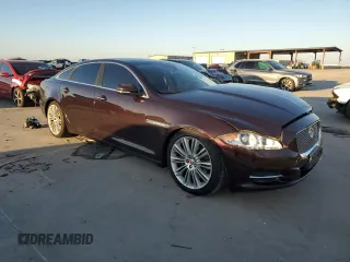 2015 Jaguar XJ Portfolio with VIN SAJWA2GZ7F8V83492, listed as a Copart auction lot 43789355 with 132,020 mi miles and Salvage Title. Bid and sale history available at carsss.com. Image 4.