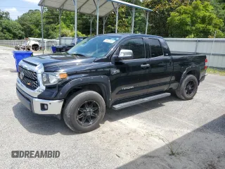 2021 Toyota Tundra SR with VIN 5TFRY5F10MX299595, listed as a Copart auction lot 58428885 with 43,707 mi miles and Salvage title. Bid and sale history available at DreamBid. Image 1.