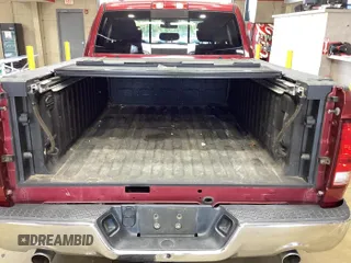 2015 Ram 1500 Outdoorsman z VIN 1C6RR7GM4FS707802, wystawiony jako IAAI lot #42260610 z przebiegiem 216 178 mil mil oraz . Historia ofert i sprzedaży dostępna na DreamBid. Obrazek 1.