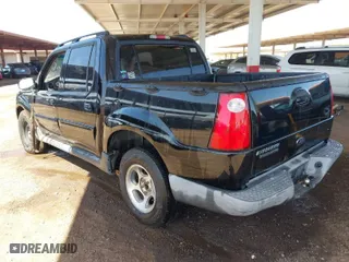 2005 Ford Explorer Sport Trac XLS with VIN 1FMZU67K65UA48667, listed as a IAAI auction lot 41637238 with 213,925 mi miles. Bid and sale history available at carsss.com. Image 3.