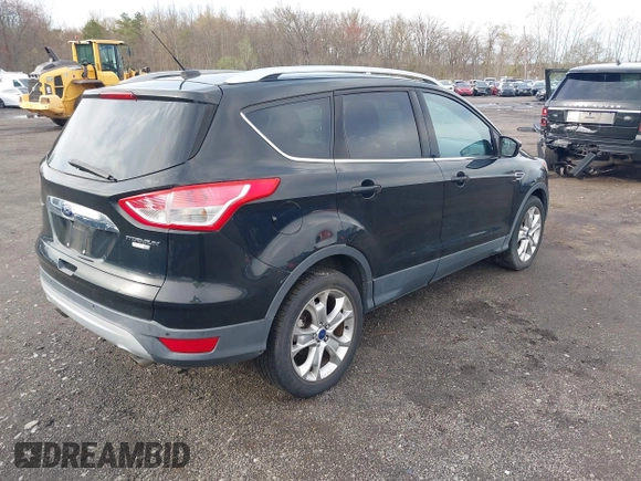 2014 Ford Escape Titanium with VIN 1FMCU9J98EUD73818, listed as a IAAI auction lot 42036442 with 129,794 mi miles. Bid and sale history available at carsss.com. Image 4.