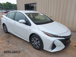 2022 Toyota Prius LE z VIN JTDKAMFP5N3213324, wystawiony jako IAAI lot #42417682 z przebiegiem 19 088 mil mil oraz . Historia ofert i sprzedaży dostępna na DreamBid. Obrazek 1.