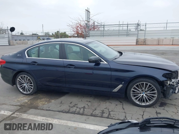 2019 BMW 5 Series 530e with VIN WBAJA9C56KB388241, listed as a IAAI auction lot 42181217 with 69,805 mi miles and . Bid and sale history available at carsss.com. Image 14.