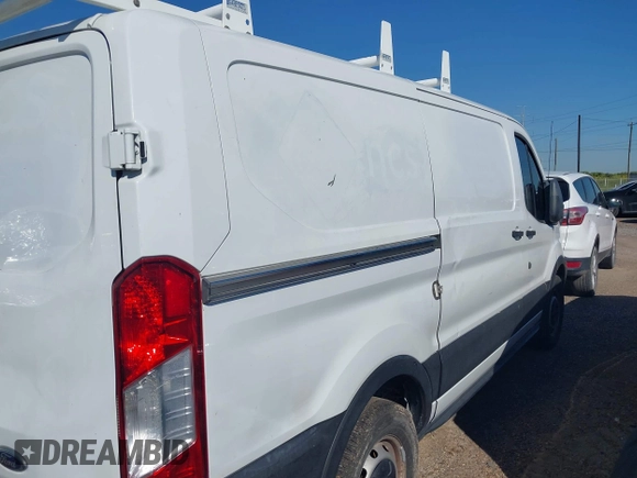 2019 Ford Transit z VIN 1FTYE1YM2KKA11865, wystawiony jako IAAI lot #42057856 z przebiegiem 71 214 mil mil oraz . Historia ofert i sprzedaży dostępna na DreamBid. Obrazek 13.