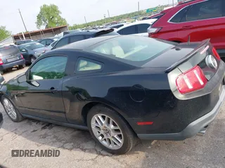 2012 Ford Mustang V6 Premium with VIN 1ZVBP8AM8C5220642, listed as a IAAI auction lot 42110826 with 106,322 mi miles. Bid and sale history available at carsss.com. Image 14.