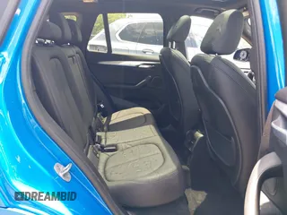 2021 BMW X1 xDrive28i with VIN WBXJG9C04M5T61811, listed as a IAAI auction lot 42509852 with 30,400 mi miles and . Bid and sale history available at DreamBid. Image 8.