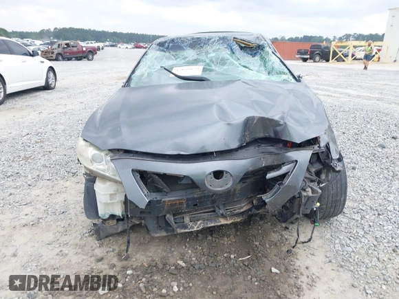 2009 Toyota Camry LE z VIN 4T1BK46KX9U594987, wystawiony jako IAAI lot #42039029 z przebiegiem 156 812 mil mil oraz . Historia ofert i sprzedaży dostępna na DreamBid. Obrazek 13.