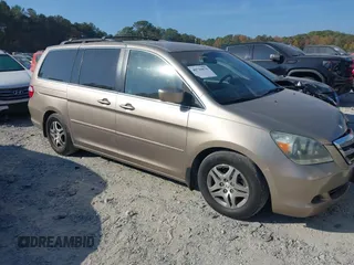 2007 Honda Odyssey EX with VIN 5FNRL38437B074662, listed as a IAAI auction lot 40716076 with 228,344 mi miles. Bid and sale history available at carsss.com. Image 1.