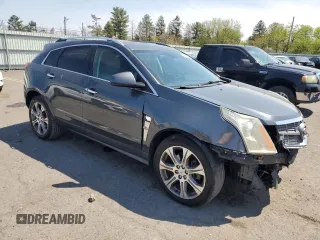 2012 Cadillac SRX Performance Collection with VIN 3GYFNEE34CS590058, listed as a Copart auction lot 54548545 with 122,070 mi miles and Salvage Title. Bid and sale history available at carsss.com. Image 4.