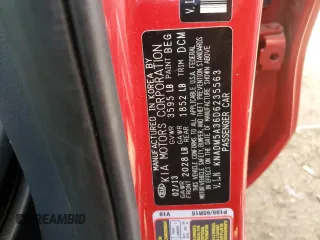 2013 Kia Rio LX with VIN KNADM5A36D6235563, listed as a Copart auction lot 52642405 with 126,034 mi miles and Salvage Title. Bid and sale history available at DreamBid. Image 12.