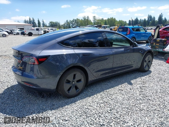 2023 Tesla Model 3 z VIN 5YJ3E1EA6PF650212, wystawiony jako IAAI lot #42554747 z przebiegiem 49 838 mil mil oraz . Historia ofert i sprzedaży dostępna na DreamBid. Obrazek 4.