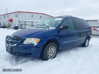 2001 Dodge Caravan Sport with VIN 2B4GP44RX1R229672, listed as a IAAI auction lot 41494222 with 217,673 mi miles. Bid and sale history available at carsss.com. Image 2.