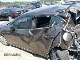 2017 Mazda 3 Grand Touring z VIN 3MZBN1M39HM127811, wystawiony jako IAAI lot #42060315 z przebiegiem Nie podano mil oraz . Historia ofert i sprzedaży dostępna na DreamBid. Obrazek 13.