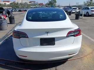 2023 Tesla Model 3 with VIN 5YJ3E1EA9PF640015, listed as a IAAI auction lot 41622086 with 15,622 mi miles and . Bid and sale history available at carsss.com. Image 16.