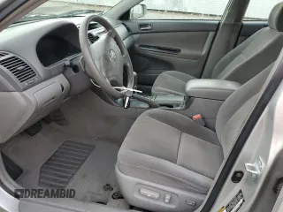 2005 Toyota Camry LE with VIN 4T1BF32KX5U601192, listed as a Copart auction lot 55365485 with 153,251 mi miles and Salvage Title. Bid and sale history available at DreamBid. Image 7.