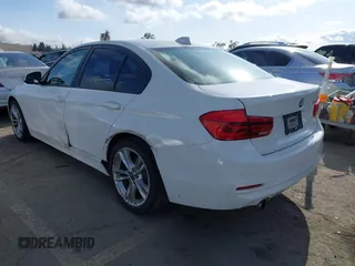 2018 BMW 3 Series 320i with VIN WBA8A9C54JAH12017, listed as a IAAI auction lot 41921292 with 49,267 mi miles. Bid and sale history available at carsss.com. Image 3.