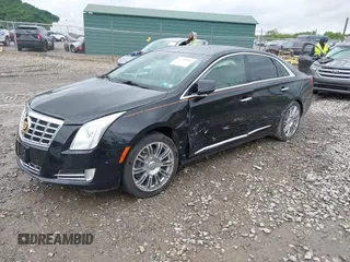 2014 Cadillac XTS Luxury with VIN 2G61M5S32E9231544, listed as a IAAI auction lot 42340088 with 74,518 mi miles and . Bid and sale history available at DreamBid. Image 17.