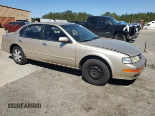 1997 Nissan Maxima GXE z VIN JN1CA21DXVT877062, wystawiony jako Copart lot #49411185 z przebiegiem 249 941 mil mil oraz Szkoda całkowita • Salvage title. Historia ofert i sprzedaży dostępna na DreamBid. Obrazek 4.