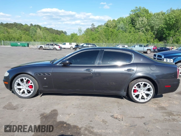 2007 Maserati Quattroporte with VIN ZAMFE39A070029397, listed as a IAAI auction lot 42027798 with 95,978 mi miles. Bid and sale history available at carsss.com. Image 14.