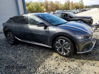 2024 Kia EV6 Wind with VIN KNDC34LA2R5202290, listed as a Copart auction lot 76450034 with 16,636 mi miles and Clean Title. Bid and sale history available at carsss.com. Image 4.