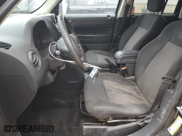 2012 Jeep Patriot Sport with VIN 1C4NJRBB0CD633584, listed as a Copart auction lot 51048195 with 158,847 mi miles and Salvage Title. Bid and sale history available at carsss.com. Image 7.