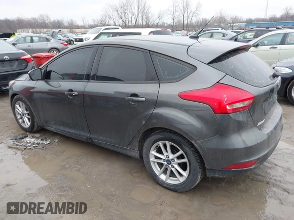 2015 Ford Focus SE with VIN 1FADP3K26FL383355, listed as a IAAI auction lot 41520459 with 142,111 mi miles and . Bid and sale history available at DreamBid. Image 14.