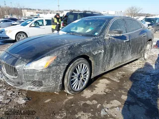 2014 Maserati Quattroporte S Q4 with VIN ZAM56RRA3E1123504, listed as a IAAI auction lot 41395299 with 49,192 mi miles. Bid and sale history available at carsss.com. Image 2.
