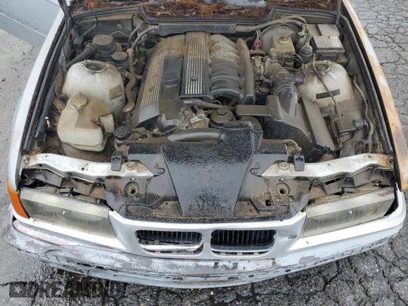 1998 BMW 3 Series 328is with VIN WBABG132XWET07045, listed as a Copart auction lot 49470225 with 186,922 mi miles and Clean Title. Bid and sale history available at carsss.com. Image 11.