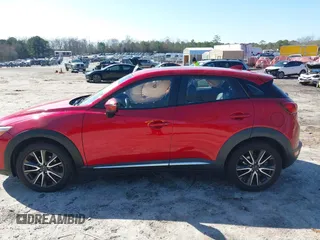 2016 Mazda CX-3 Grand Touring with VIN JM1DKFD72G0129096, listed as a IAAI auction lot 41592893 with 144,860 mi miles. Bid and sale history available at carsss.com. Image 13.