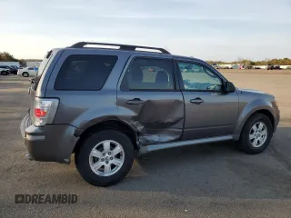 2010 Mercury Mariner z VIN 4M2CN9B70AKJ28137, wystawiony jako Copart lot #48926345 z przebiegiem 100 975 mil mil oraz Szkody całkowita. Historia ofert i sprzedaży dostępna na DreamBid. Obrazek 3.