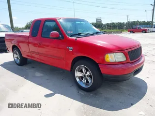 2002 Ford F-150 XL with VIN 1FTRX17W32NB15930, listed as a IAAI auction lot 42846328 with Not provided miles and . Bid and sale history available at DreamBid. Image 1.