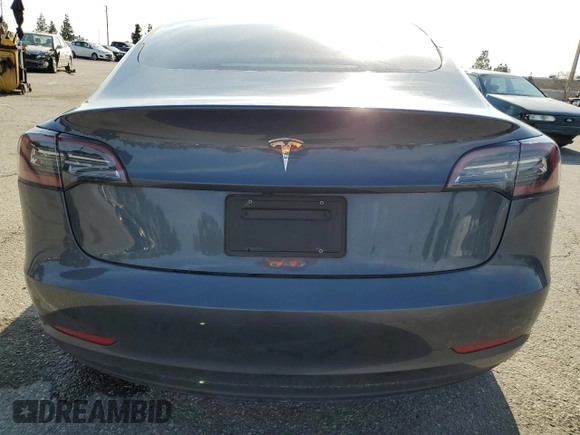2023 Tesla Model 3 с VIN 5YJ3E1EA9PF412192, выставлен на аукционе Copart как лот 52122045 с пробегом 72 230 миль миль и Списание • Salvage title. История ставок и продаж доступна на DreamBid. Изображение 6.