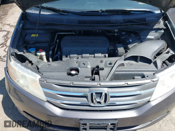 2012 Honda Odyssey EX-L with VIN 5FNRL5H68CB006686, listed as a IAAI auction lot 42039035 with 338,331 mi miles and . Bid and sale history available at carsss.com. Image 10.