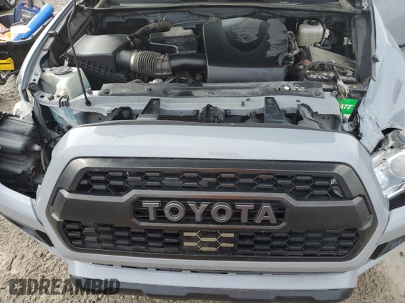 2019 Toyota Tacoma SR z VIN 3TMCZ5AN9KM206637, wystawiony jako Copart lot #48753665 z przebiegiem 88 864 mil mil oraz Szkoda całkowita • Salvage title. Historia ofert i sprzedaży dostępna na DreamBid. Obrazek 12.