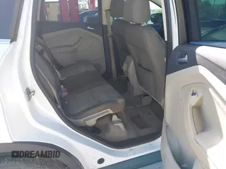 2013 Ford Escape SE with VIN 1FMCU0GX1DUB71466, listed as a IAAI auction lot 42329136 with 103,763 mi miles and . Bid and sale history available at DreamBid. Image 8.