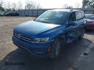 2020 Volkswagen Tiguan S with VIN 3VV1B7AXXLM002683, listed as a IAAI auction lot 41533012 with 108,257 mi miles and . Bid and sale history available at DreamBid. Image 2.