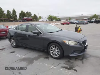 2016 Mazda 6 i Sport with VIN JM1GJ1U55G1426584, listed as a IAAI auction lot 42121074 with 235,964 mi miles and . Bid and sale history available at DreamBid. Image 1.