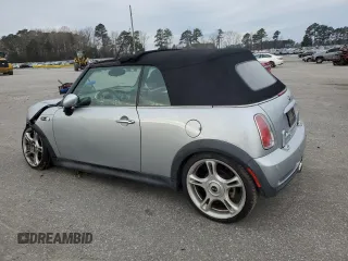 2005 MINI Convertible S with VIN WMWRH33575TK56034, listed as a Copart auction lot 88043565 with 33,410 mi miles and Salvage title. Bid and sale history available at DreamBid. Image 2.