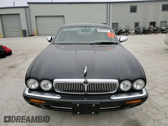 1999 Jaguar XJ z VIN SAJKD6043XC872105, wystawiony jako Copart lot #86270724 z przebiegiem Nie podano mil oraz Szkoda całkowita • Salvage title. Historia ofert i sprzedaży dostępna na DreamBid. Obrazek 11.