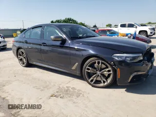 2019 BMW 5 Series M550i xDrive z VIN WBAJB9C56KB464277, wystawiony jako Copart lot #52348835 z przebiegiem 46 131 mil mil oraz Szkoda całkowita • Salvage title. Historia ofert i sprzedaży dostępna na DreamBid. Obrazek 4.
