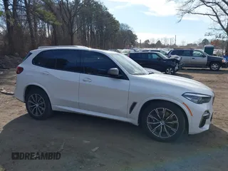 2020 BMW X5 M50i with VIN 5UXJU4C06LLE45651, listed as a IAAI auction lot 41618355 with 70,885 mi miles and . Bid and sale history available at DreamBid. Image 13.