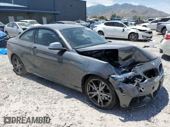 2015 BMW 2 Series M235i with VIN WBA1J7C55FV253647, listed as a Copart auction lot 60231395 with 57,639 mi miles and Salvage title. Bid and sale history available at DreamBid. Image 4.