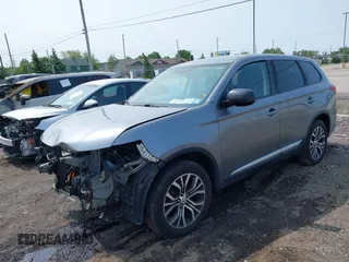 2016 Mitsubishi Outlander SE z VIN JA4AZ3A3XGZ049548, wystawiony jako IAAI lot #42393429 z przebiegiem 74 218 mil mil oraz . Historia ofert i sprzedaży dostępna na DreamBid. Obrazek 2.