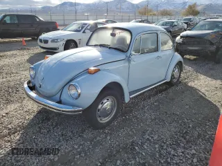 1972 Volkswagen Beetle with VIN 1122170667, listed as a Copart auction lot 80990864 with 74,800 mi miles and Salvage Title. Bid and sale history available at DreamBid. Image 1.
