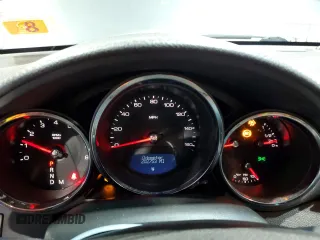 2008 Cadillac CTS AWD z VIN 1G6DG577480197914, wystawiony jako Copart lot #52956555 z przebiegiem 202 753 mil mil oraz Szkoda całkowita • Salvage title. Historia ofert i sprzedaży dostępna na DreamBid. Obrazek 9.