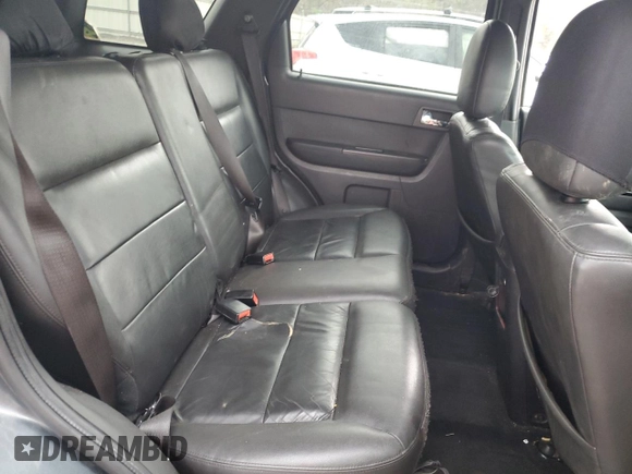 2009 Ford Escape Limited z VIN 1FMCU94G69KA60682, wystawiony jako Copart lot #53935835 z przebiegiem 199 973 mil mil oraz Szkoda całkowita • Salvage title. Historia ofert i sprzedaży dostępna na DreamBid. Obrazek 11.