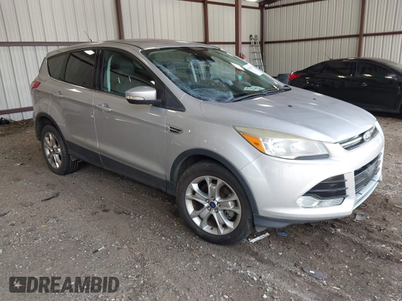 2013 Ford Escape SEL z VIN 1FMCU9HX0DUB99150, wystawiony jako IAAI lot #42812971 z przebiegiem 212 298 mil mil oraz . Historia ofert i sprzedaży dostępna na DreamBid. Obrazek 1.