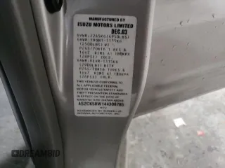 2004 Isuzu Rodeo S z VIN 4S2CK58W144306785, wystawiony jako Copart lot #85124684 z przebiegiem 296 433 mil mil oraz Szkody całkowita. Historia ofert i sprzedaży dostępna na DreamBid. Obrazek 15.